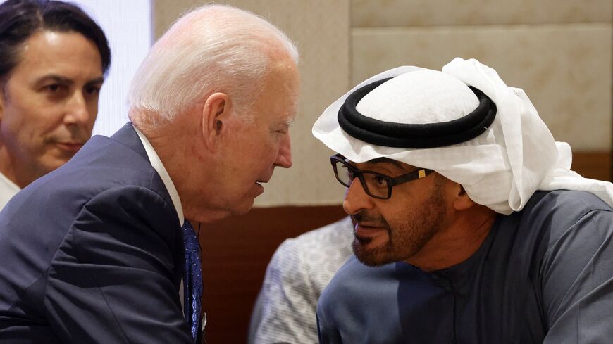 UAE's president, Sheikh Mohamed bin Zayed al-Nahyan (L), speaks with US President Joe Biden as they attend a session of the G20 Leaders' Summit at the Bharat Mandapam in New Delhi on September 9, 2023.